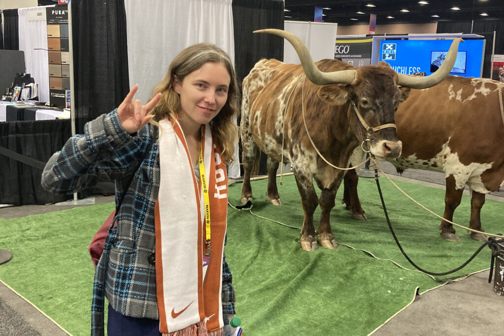 woman posing with longhrons